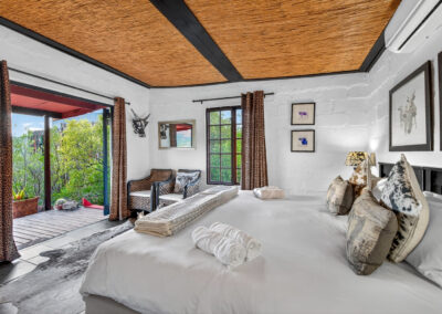 Nguni Chalet 2 Nguni chalet bedroom with direct access to a private veranda