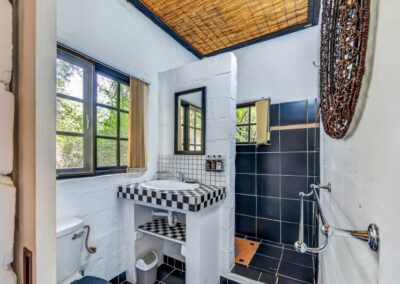 Zebra Chalet 5 Zebra chalet's en-suite bathroom equipped with a shower