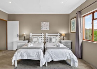 Kudu chalet's second bedroom equipped with two single beds